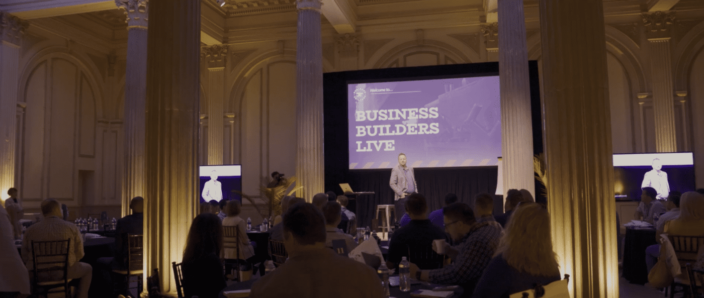 Jay Owen speaking on stage