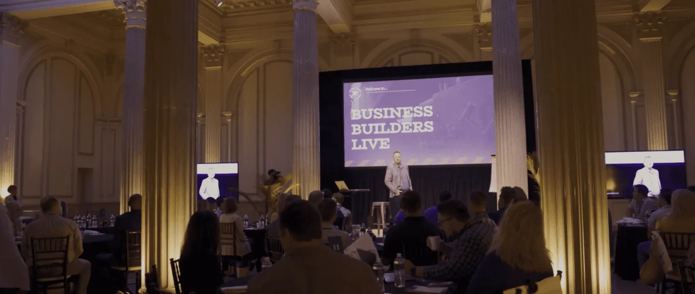 Jay Owen speaking on stage
